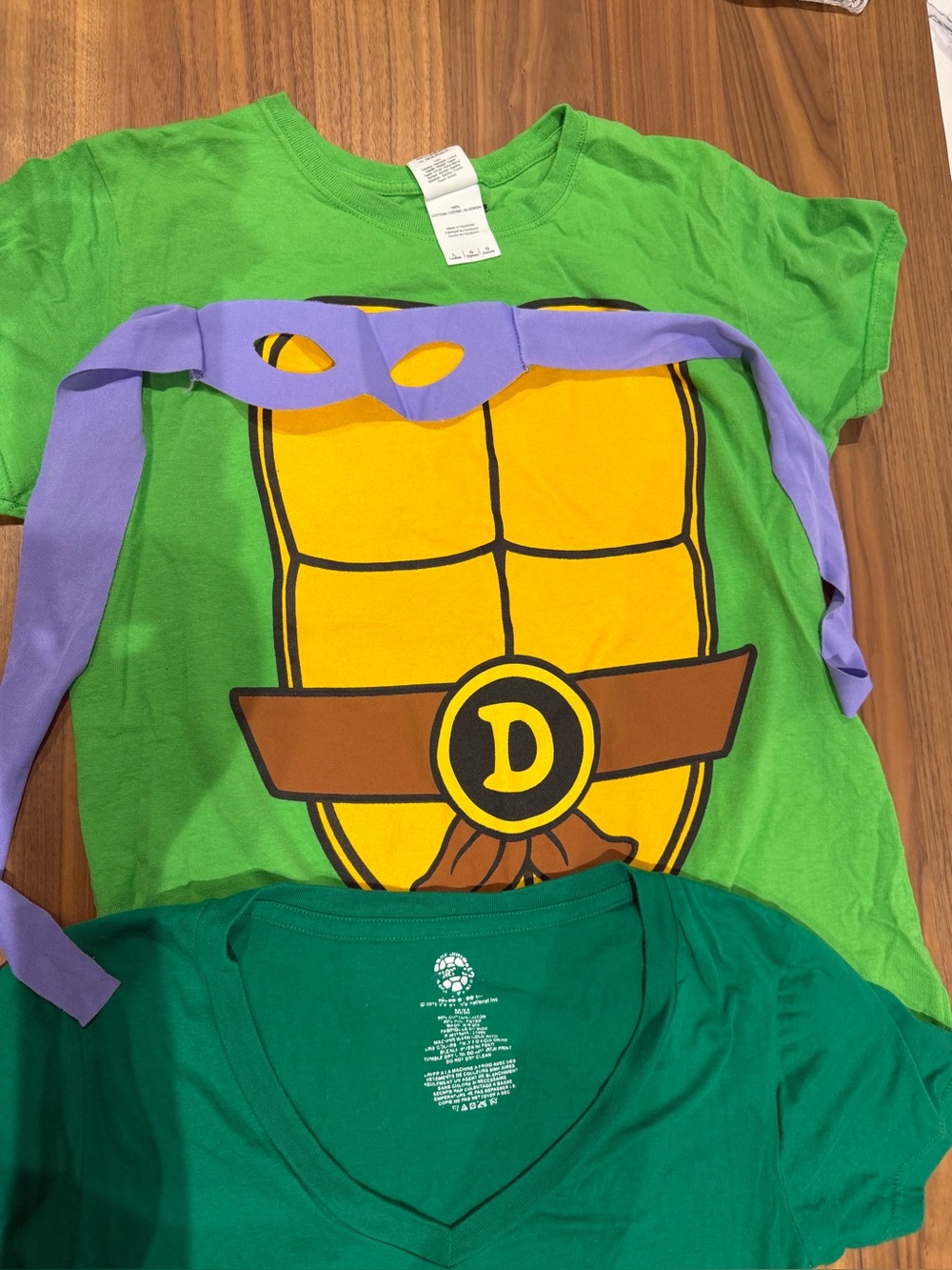 Set of 2 Teenage Mutant Ninja Turtle Costume T-Shirts with Purple Mask.